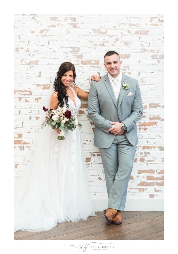 Rhode Island wedding photographer Sara Zarrella Photography captures bride and groom in Crowne Plaza