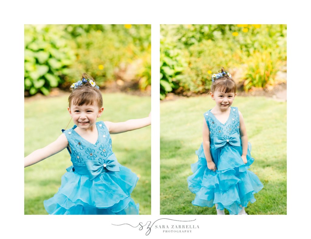 flower girl in blue gown twirls at Kirkbrae Country Club
