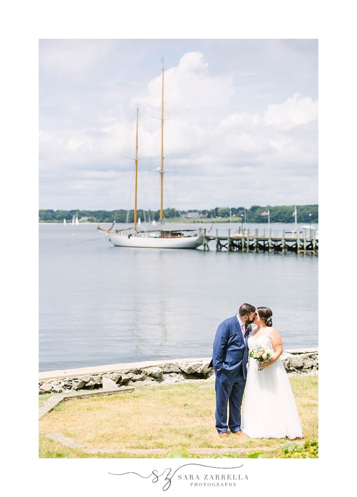 bride and groom portraits by Narragansett Bay