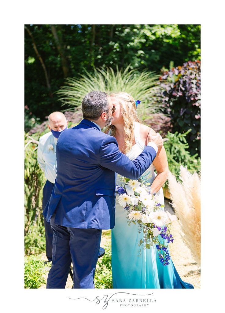 intimate backyard wedding kiss photographed by Sara Zarrella Photography