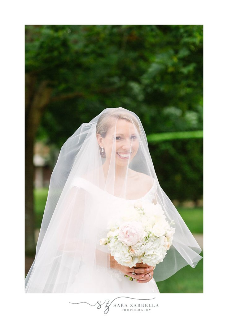 bridal portrait with veil on Providence College campus