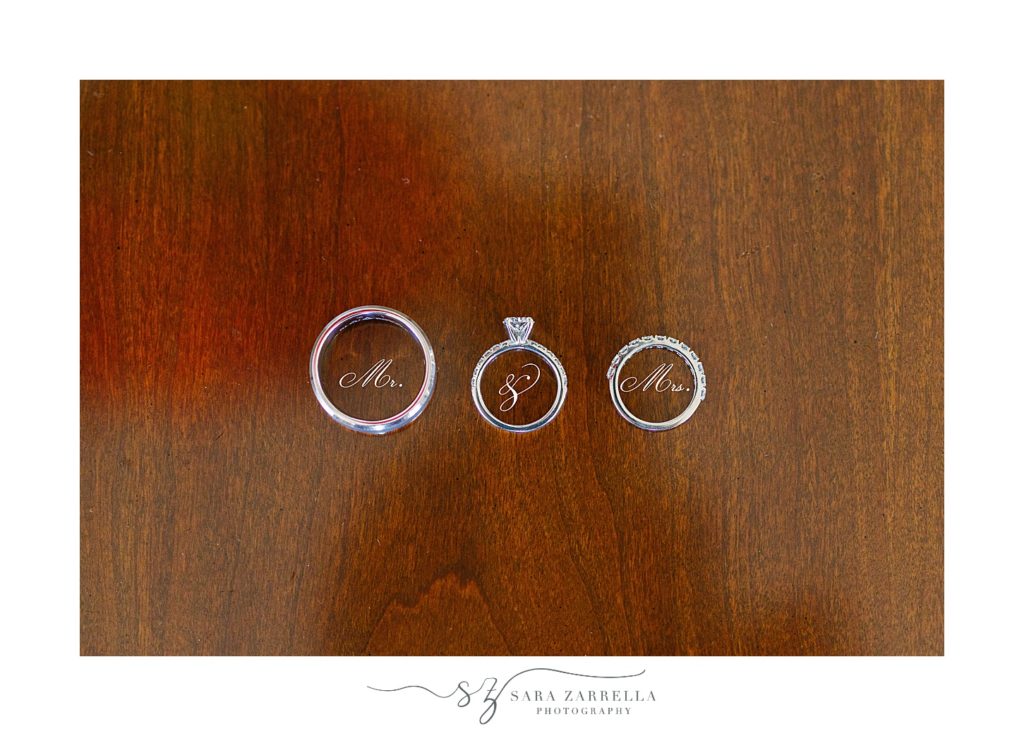 wedding rings on wooden table