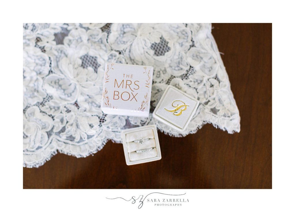 wedding ring in Mrs Box on lace