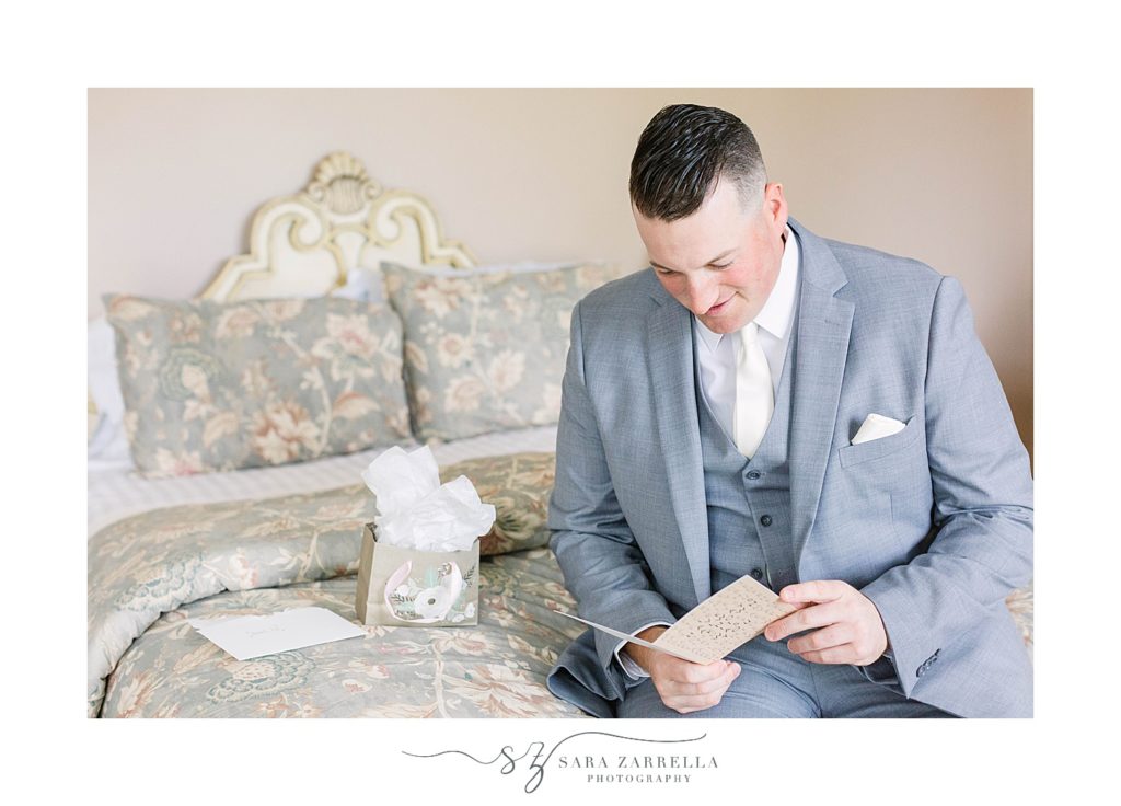 groom opens gifts from bride on wedding day
