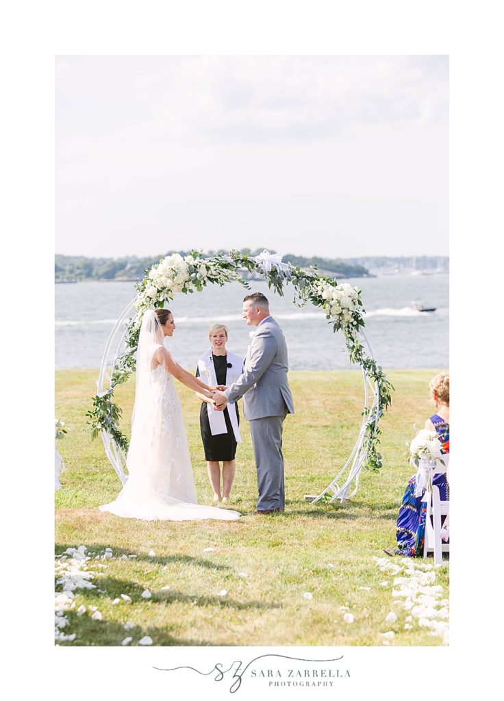 bride and groom exchange vows in Newport RI