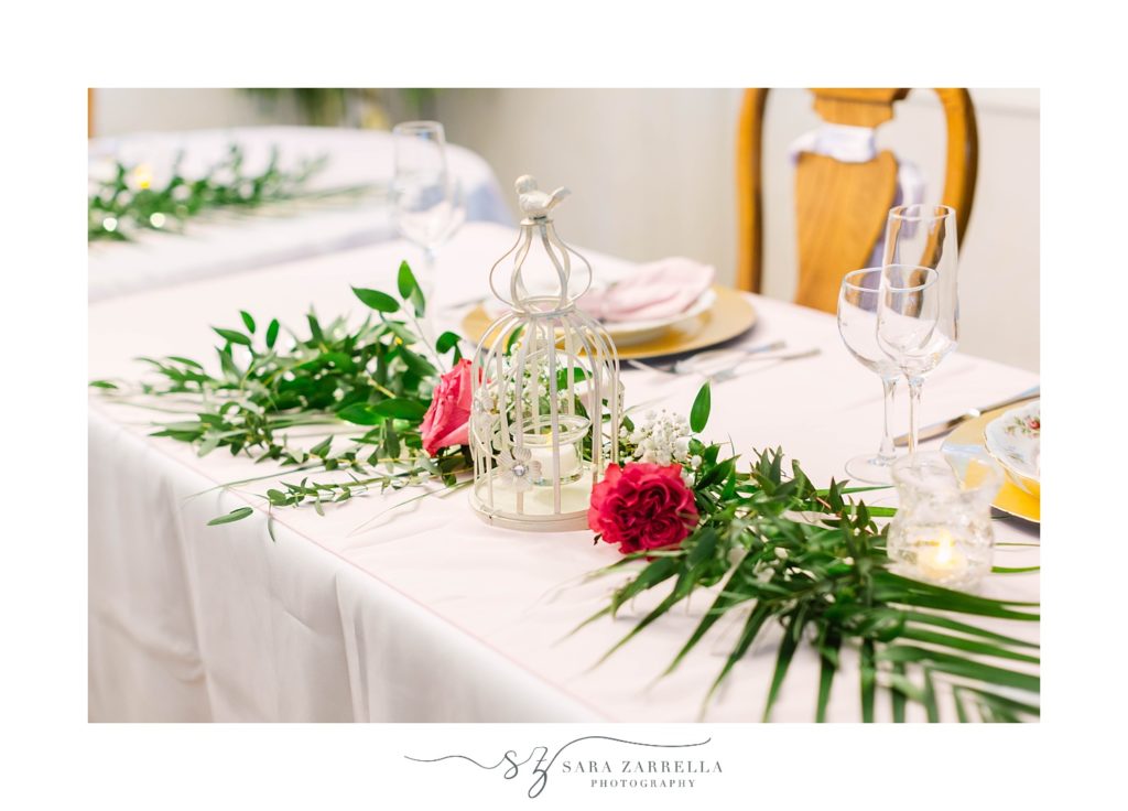 sweetheart table with white lantern