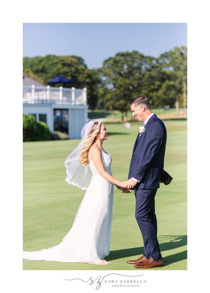 bride and groom have first look at Warwick Country Club