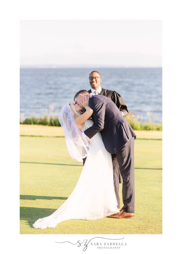 groom kisses bride after wedding ceremony in Rhode Island
