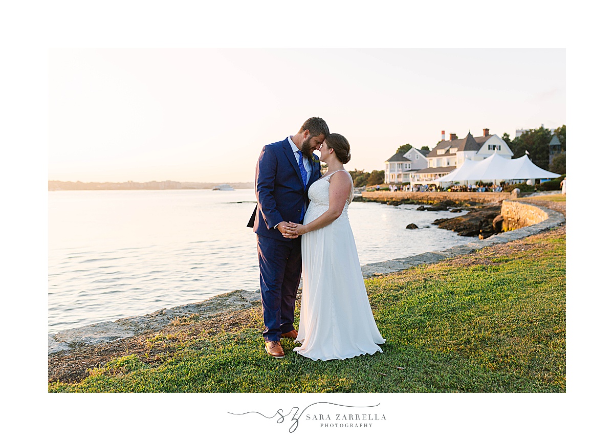 newlyweds kiss by water in Groton CT
