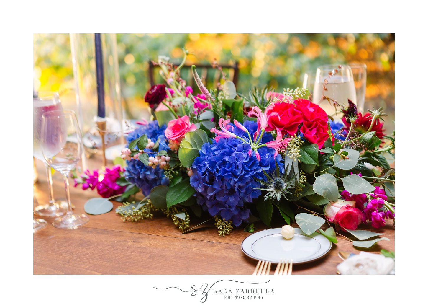 wedding reception with pink and purple florals