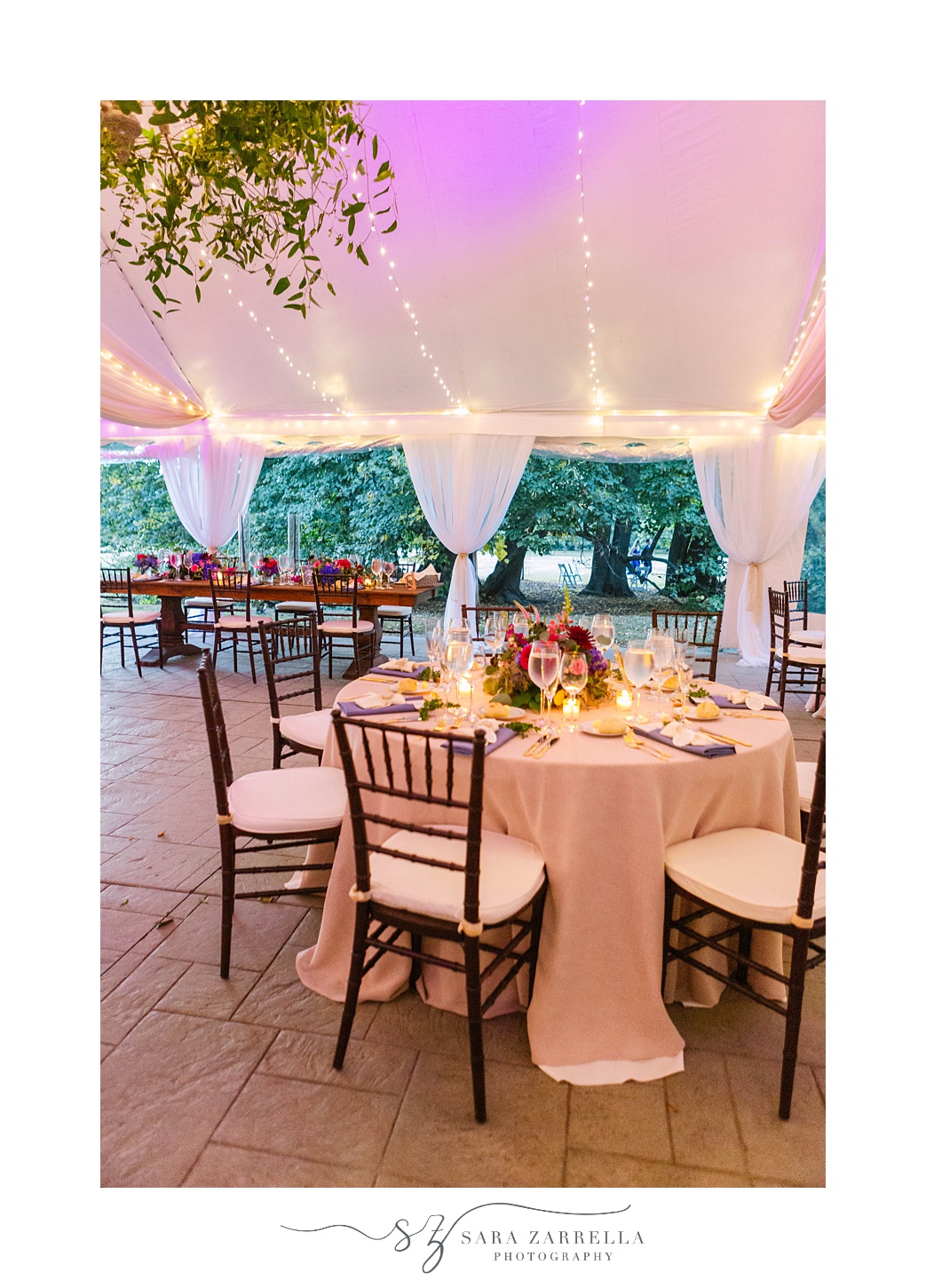 Blithewold Mansion wedding reception details with pink uplighting