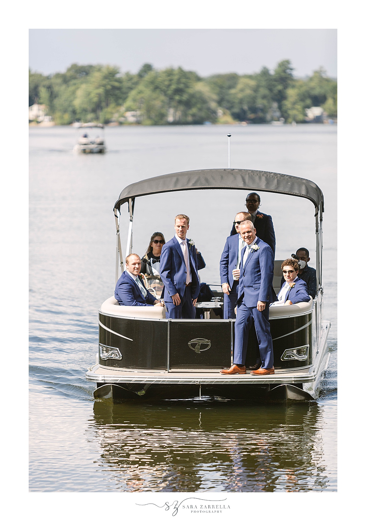 groom enters wedding ceremony on boat