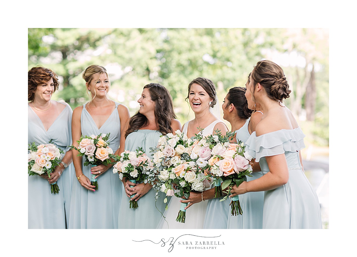 bride laughs with bridesmaids in Rhode ISland