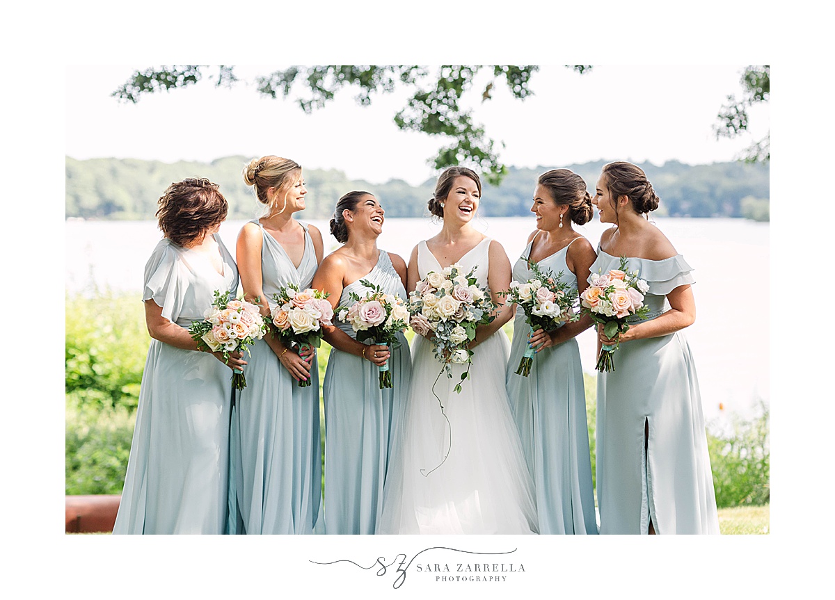 Rhode Island bride laughs with bridesmaids