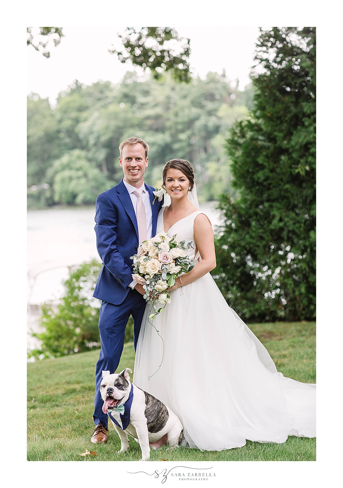 newlyweds pose with dog after Rhode Island wedding