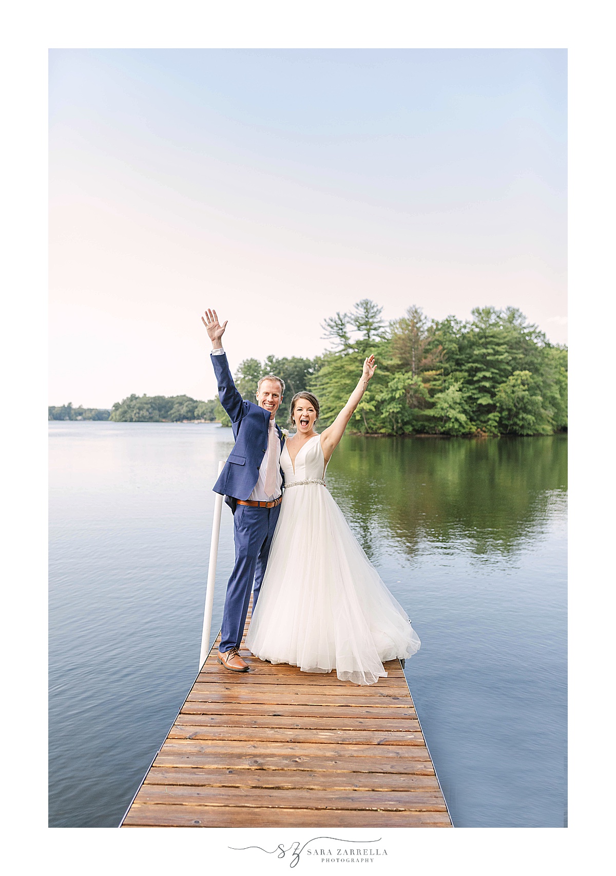 dockside wedding portraits by lake in Rhode Island