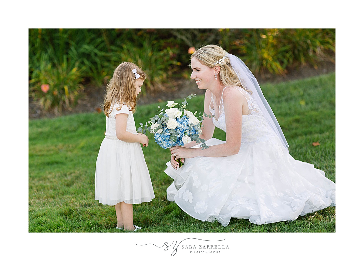 bride talks with flower girl in Newport RI