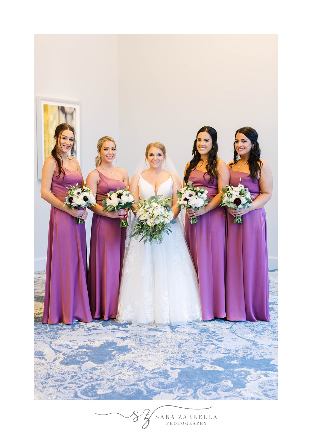 bride poses with bridesmaids at Kirkbrae Country Club