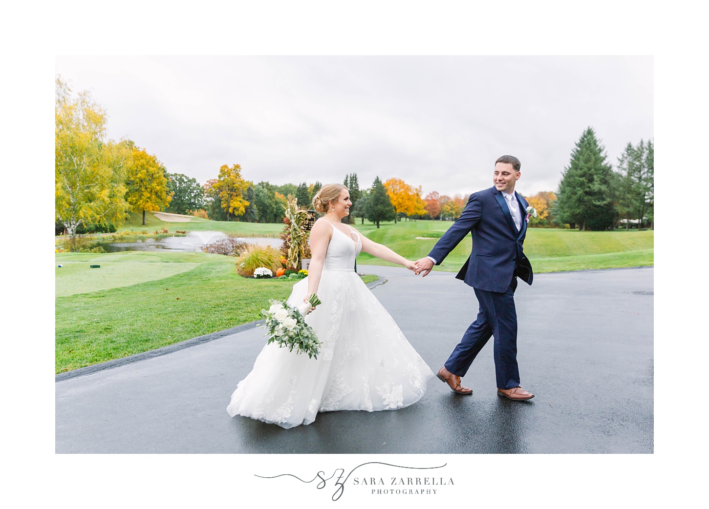 groom leads bride outside Kirkbrae Country Club on rainy wedding day