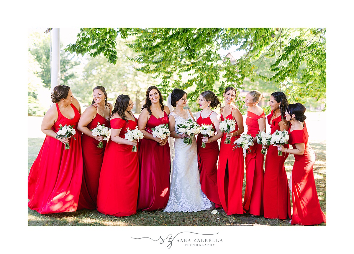 bridesmaids in red gowns for fall wedding in RI