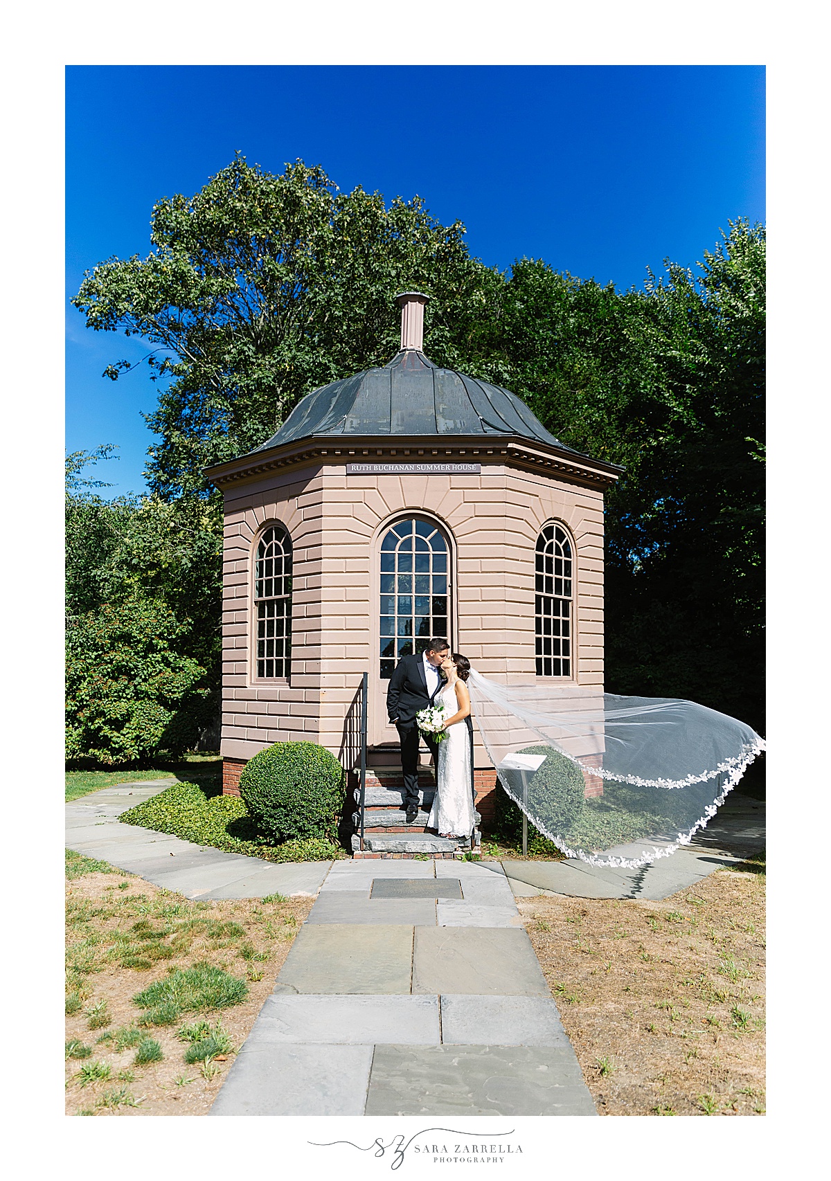 wedding portraits in Rhode Island with bride's veil floating