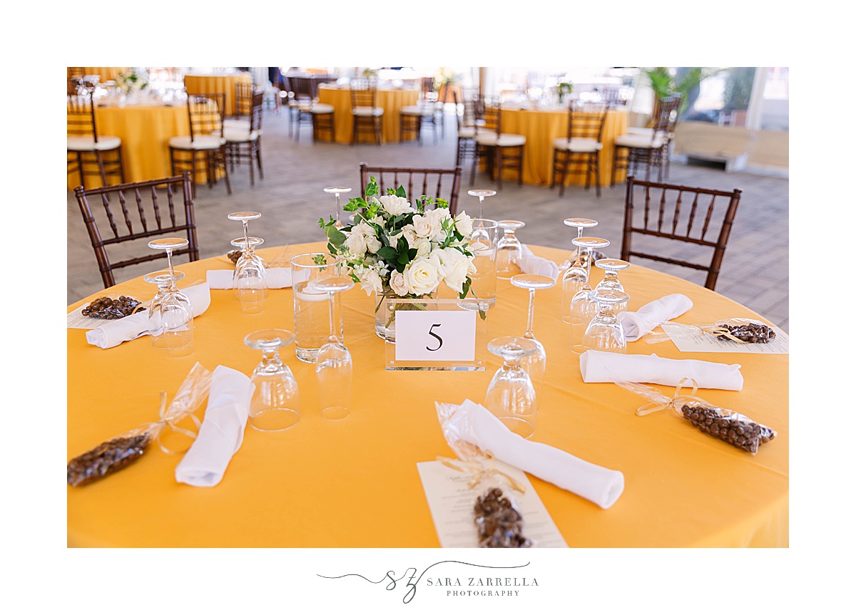 place settings on gold tablecloth