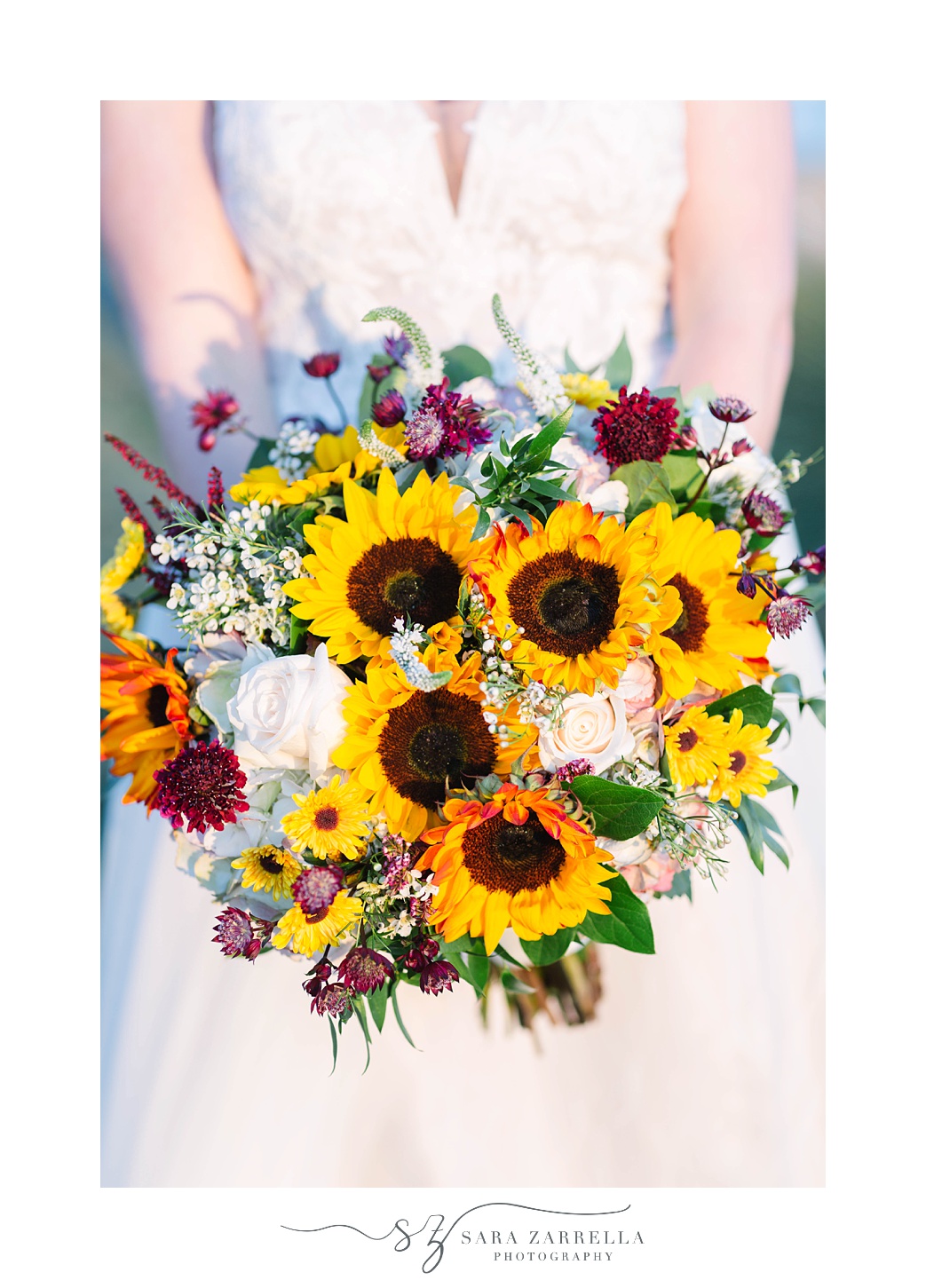 bride holds bouquet of sunflowers 