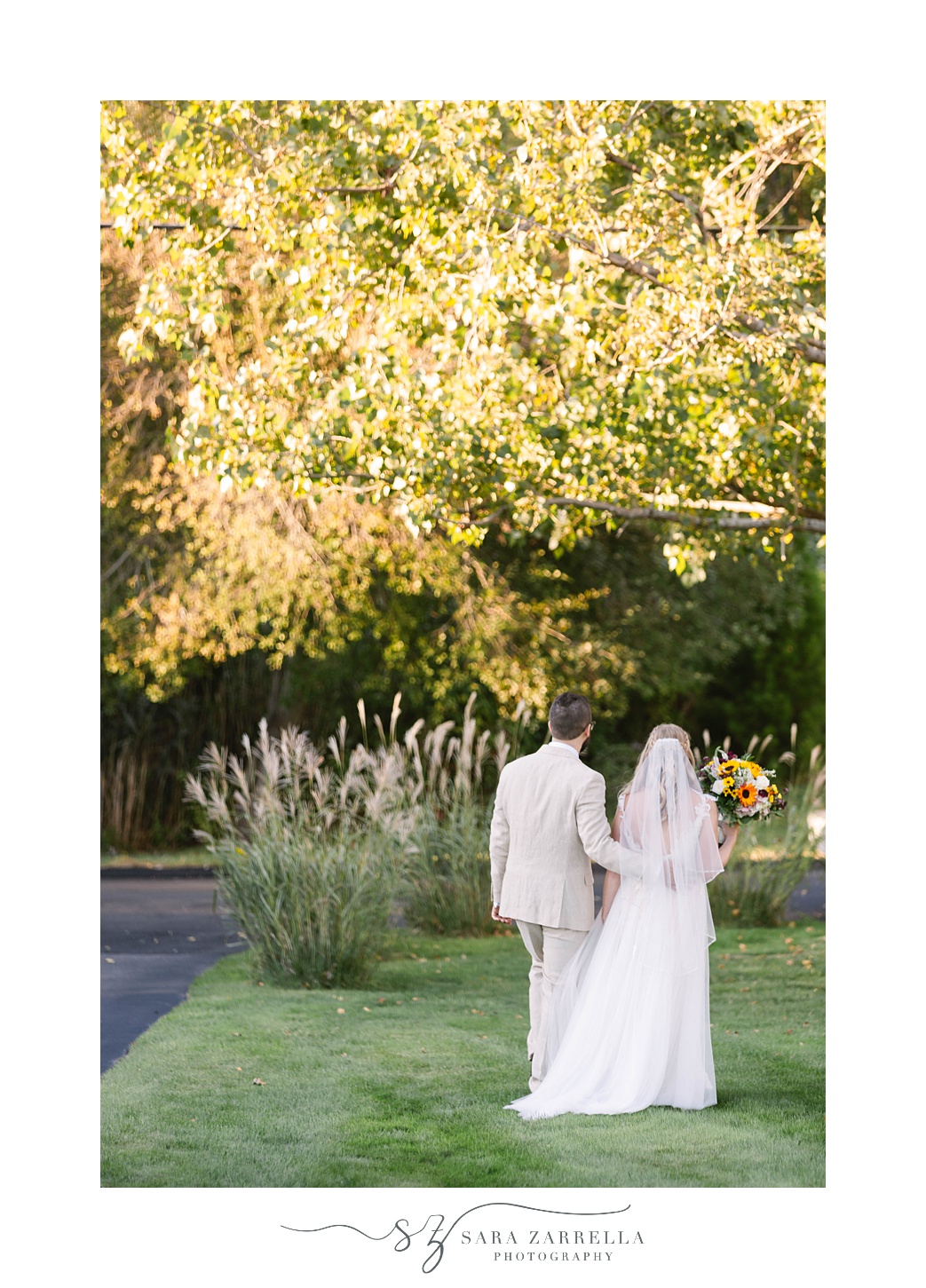 newlyweds walk away from ceremony in Warwick RI backyard