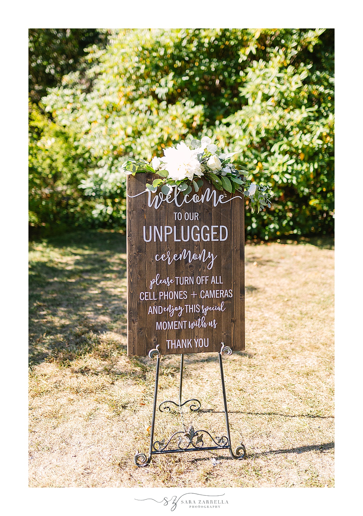 rustic wooden sign for unplugged wedding