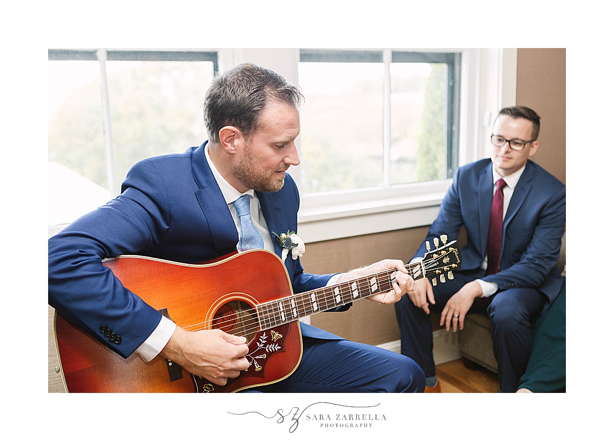 groom plays guitar gifted to him on wedding day