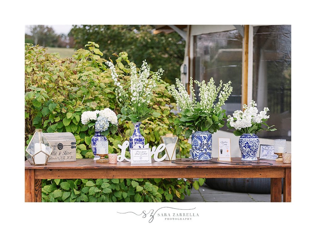 memory table with blue china for Castle Hill Inn reception