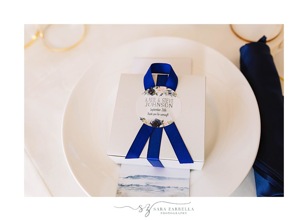place settings for Castle Hill Inn wedding reception with blue ribbon