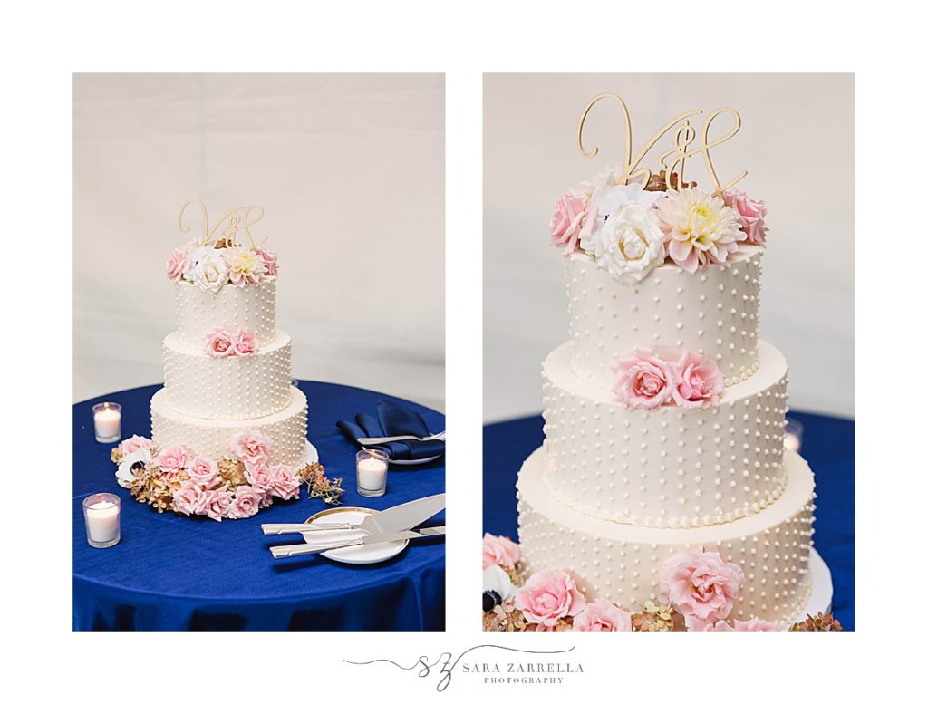 tiered wedding cake with pink flowers and gold topper