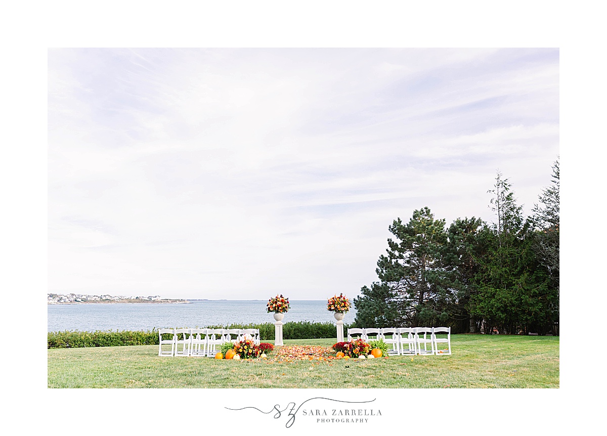 outdoor wedding ceremony with florals by Sayles Livingston Design