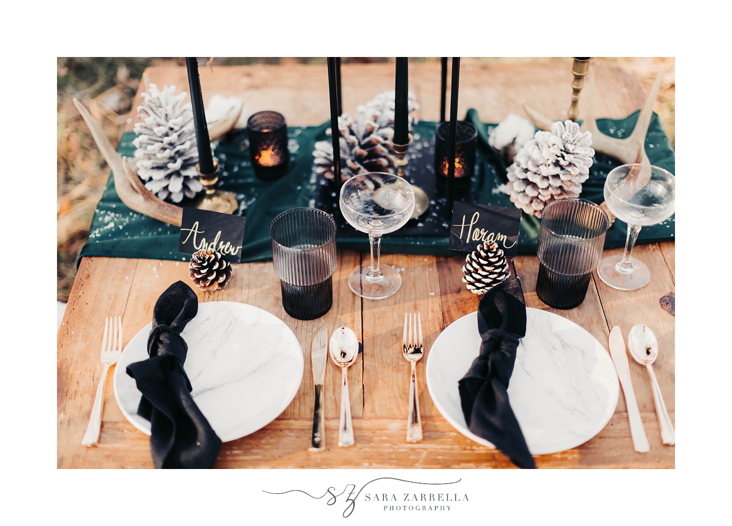 cozy winter proposal place settings with pinecones and emerald green table runner