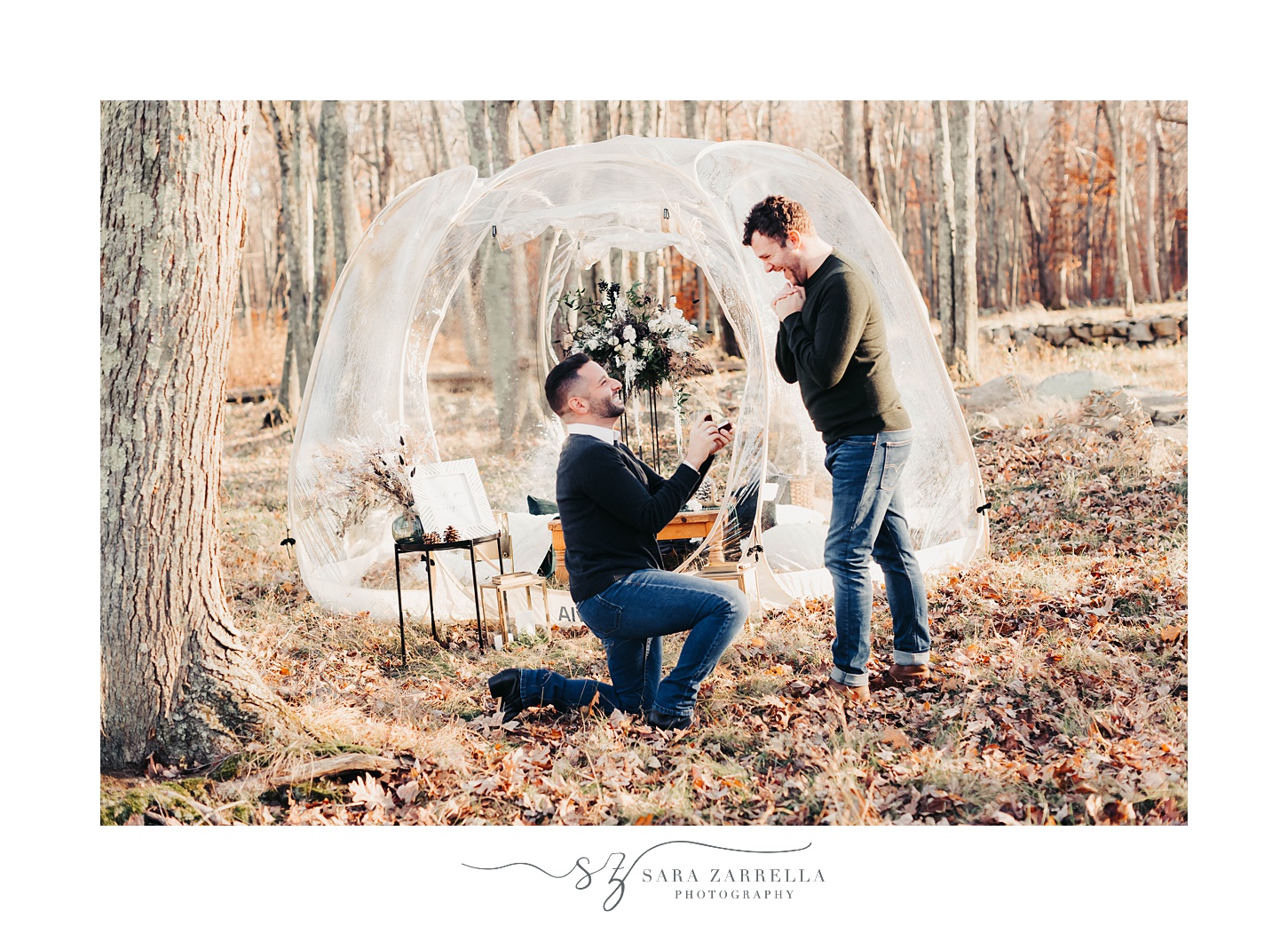 cozy winter proposal in front of igloo in winter