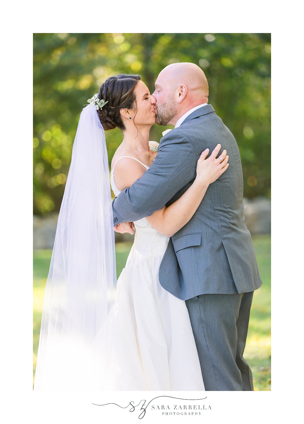 newlyweds kiss during Gerald's Farm wedding portraits 