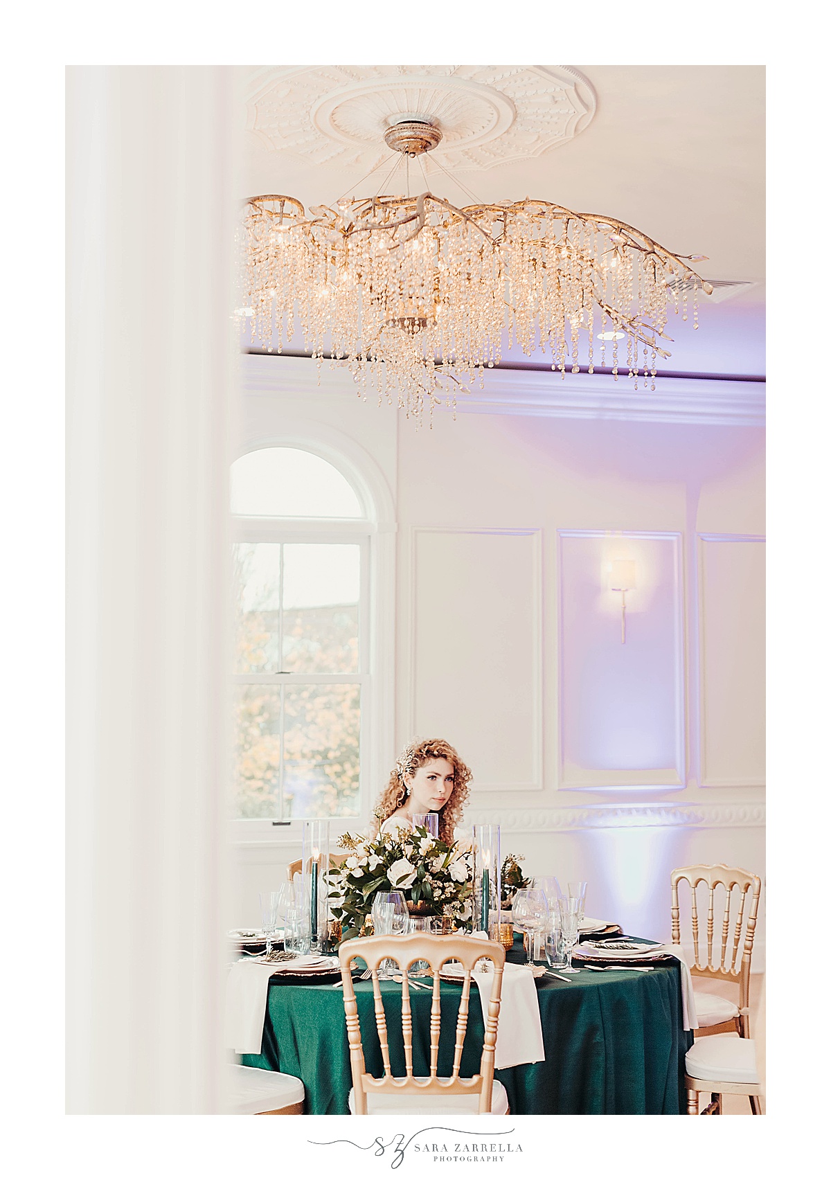 bride sits at table in Newport RI
