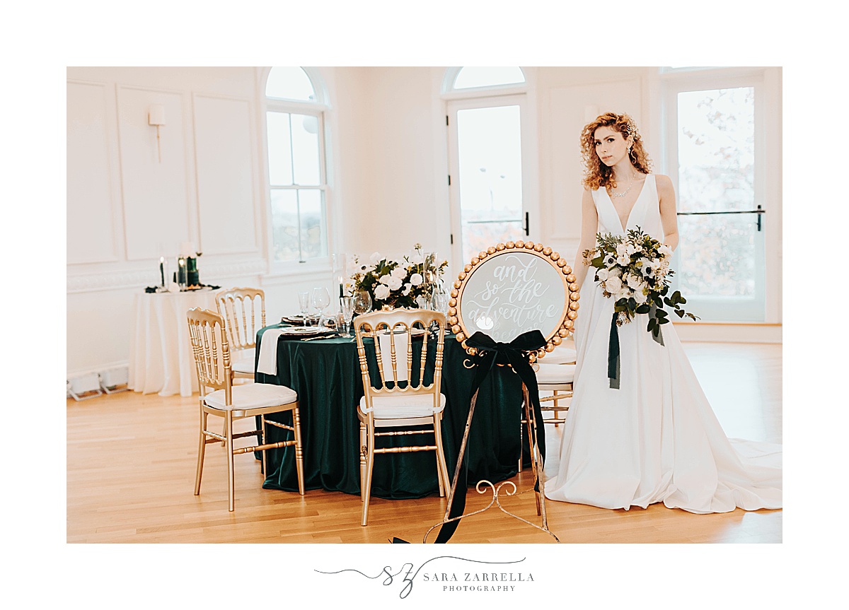 bridal portrait by reception table at modern winter wedding