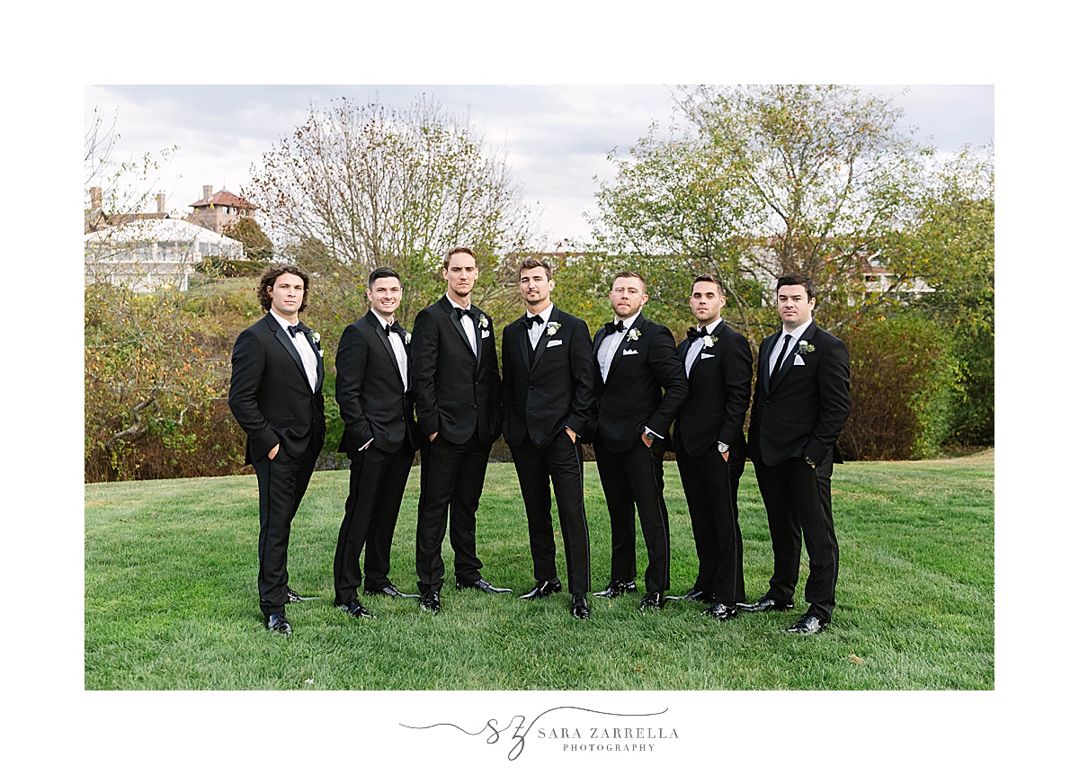 groom and groomsmen pose together after Castle Hill Inn microwedding