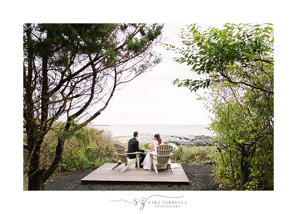 Castle Hill Inn wedding portraits in chairs overlooking Narragansett Bay