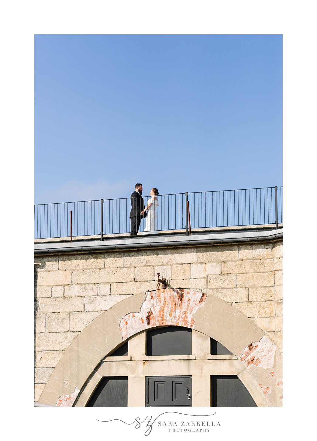 bride and groom meet on top of fort in Newport RI for first look