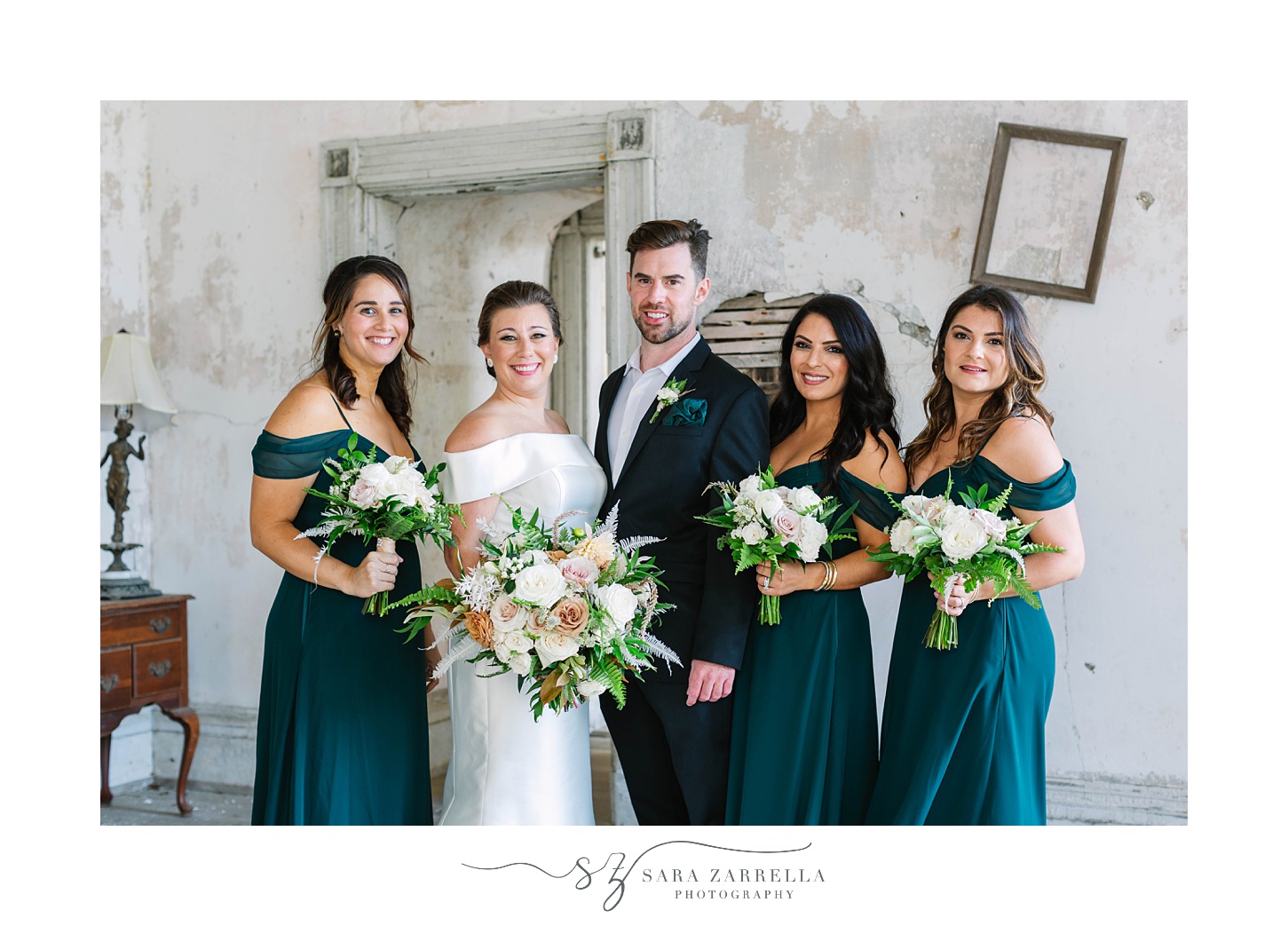 bride poses with bridesmaids and bridesmaid on Fort Adams wedding day