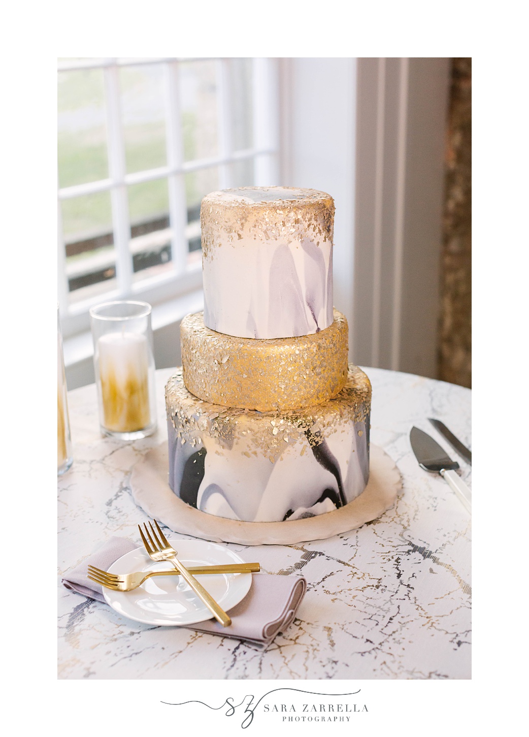 tiered wedding cake with gold details