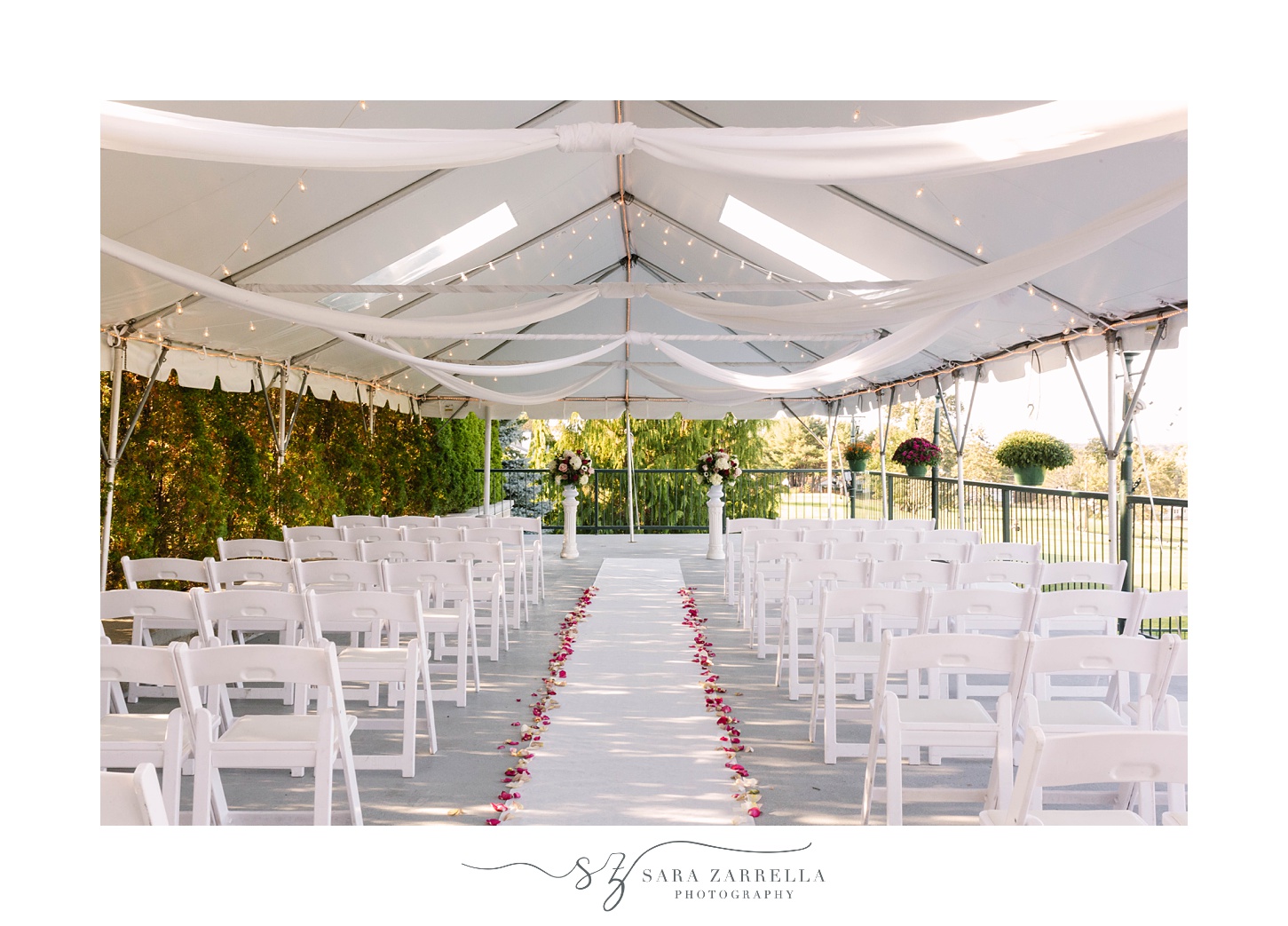 ceremony setup under tent at Kirkbrae Country Club