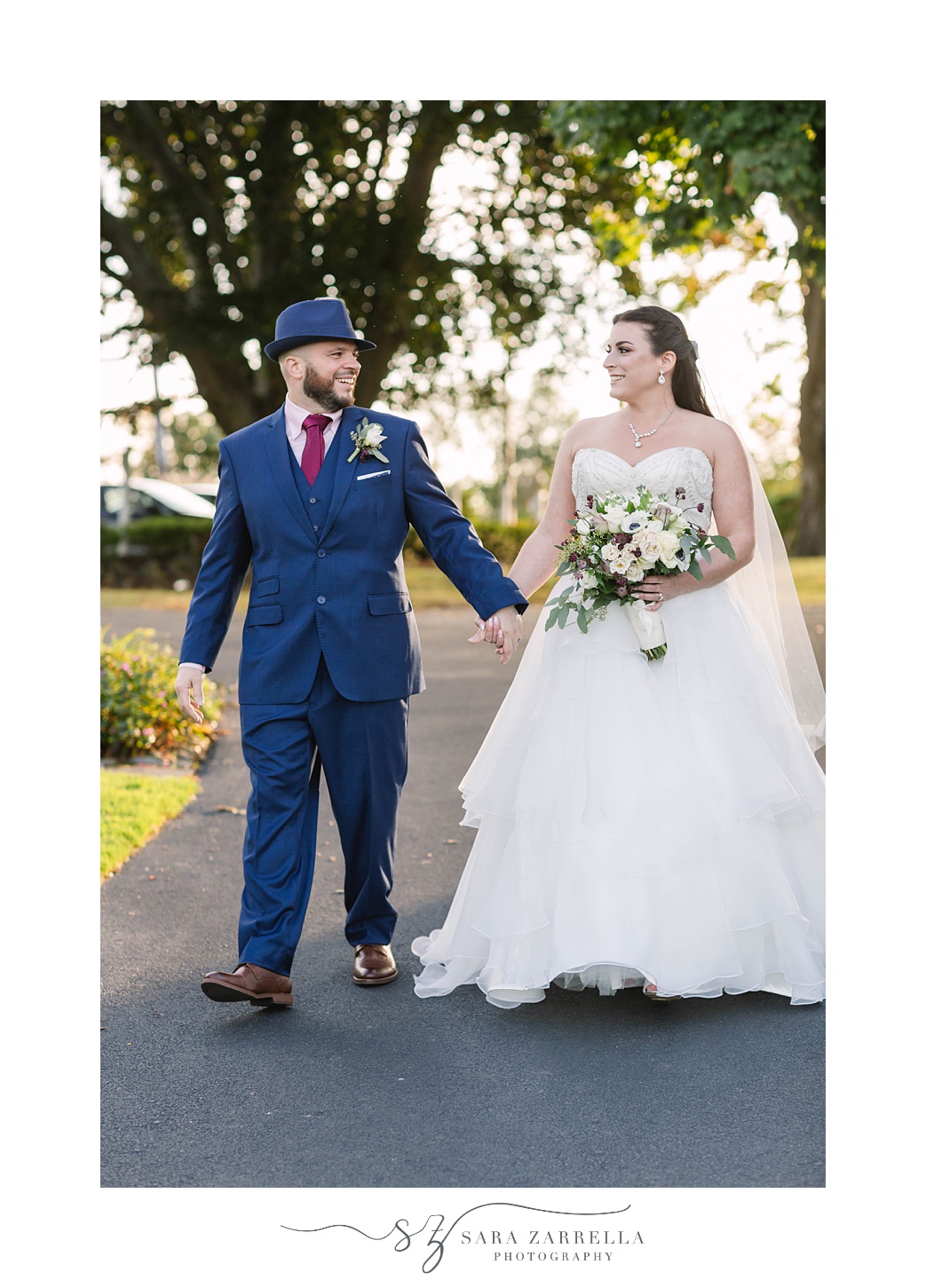 bride and groom walk through Kirkbrae Country Club
