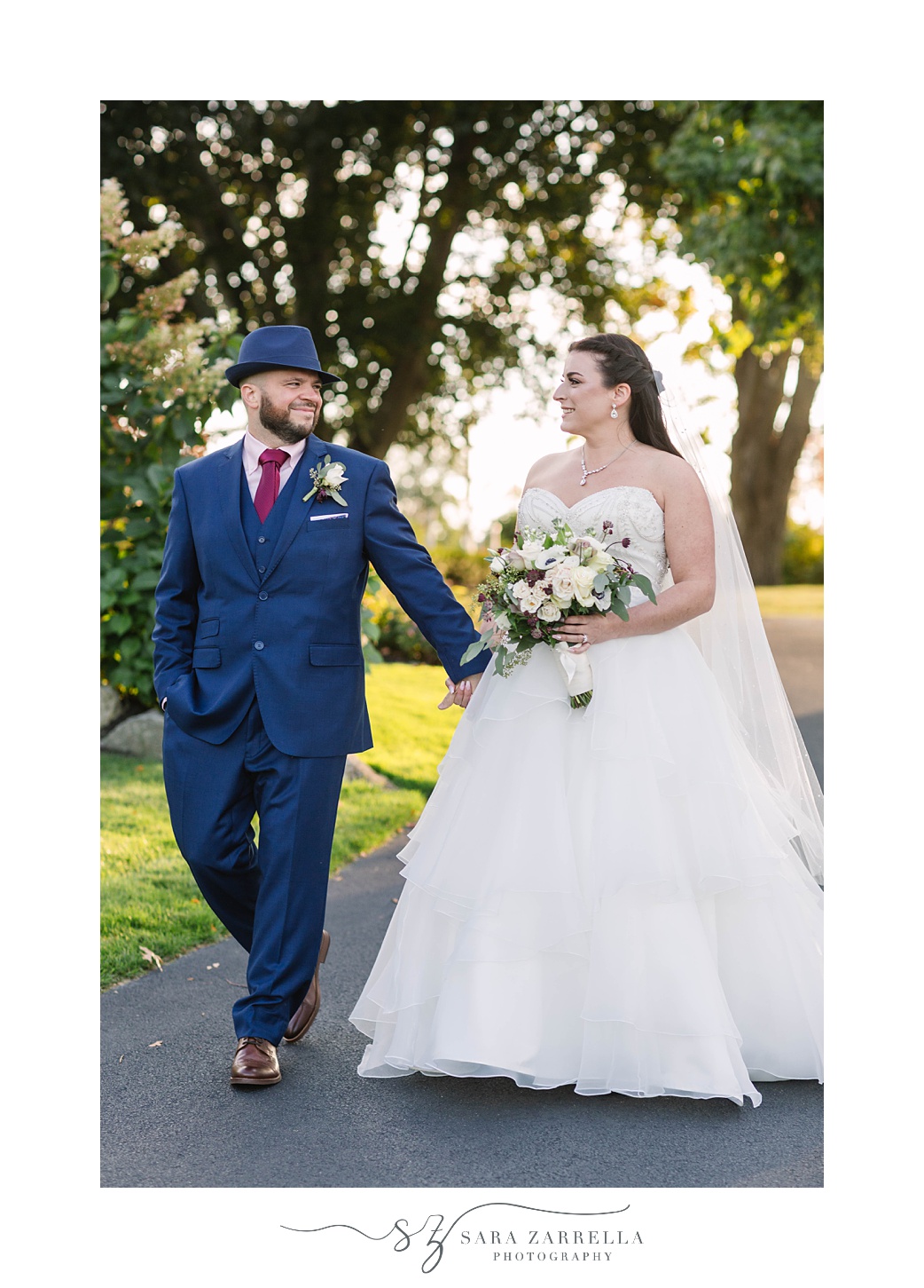 newlyweds walk after Intimate Kirkbrae Country Club Wedding ceremony