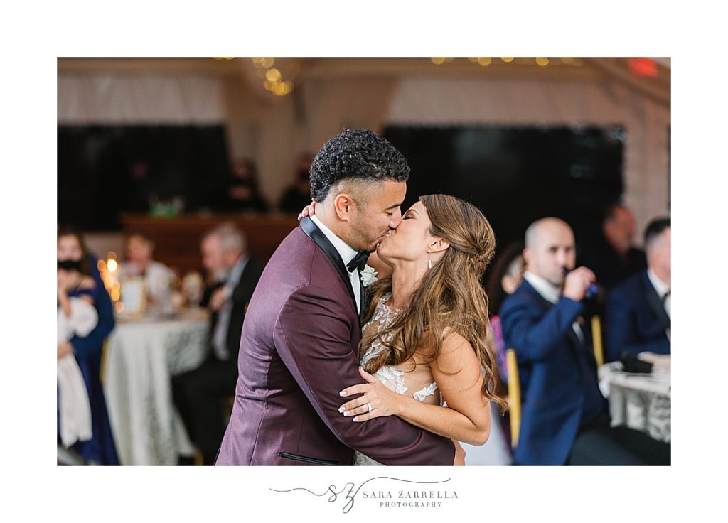 newlyweds kiss on dance floor during Atlantic Resort Newport Wedding reception 