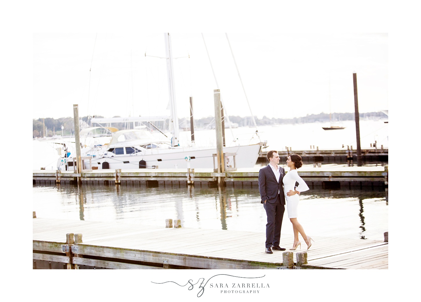 engagement portraits on dock in Rhode Island