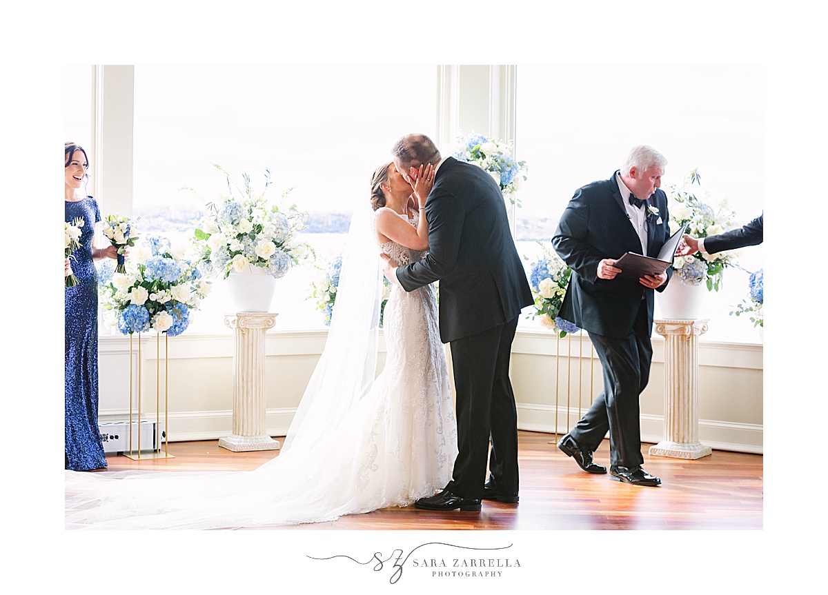 bride and groom kiss during OceanCliff Hotel ceremony